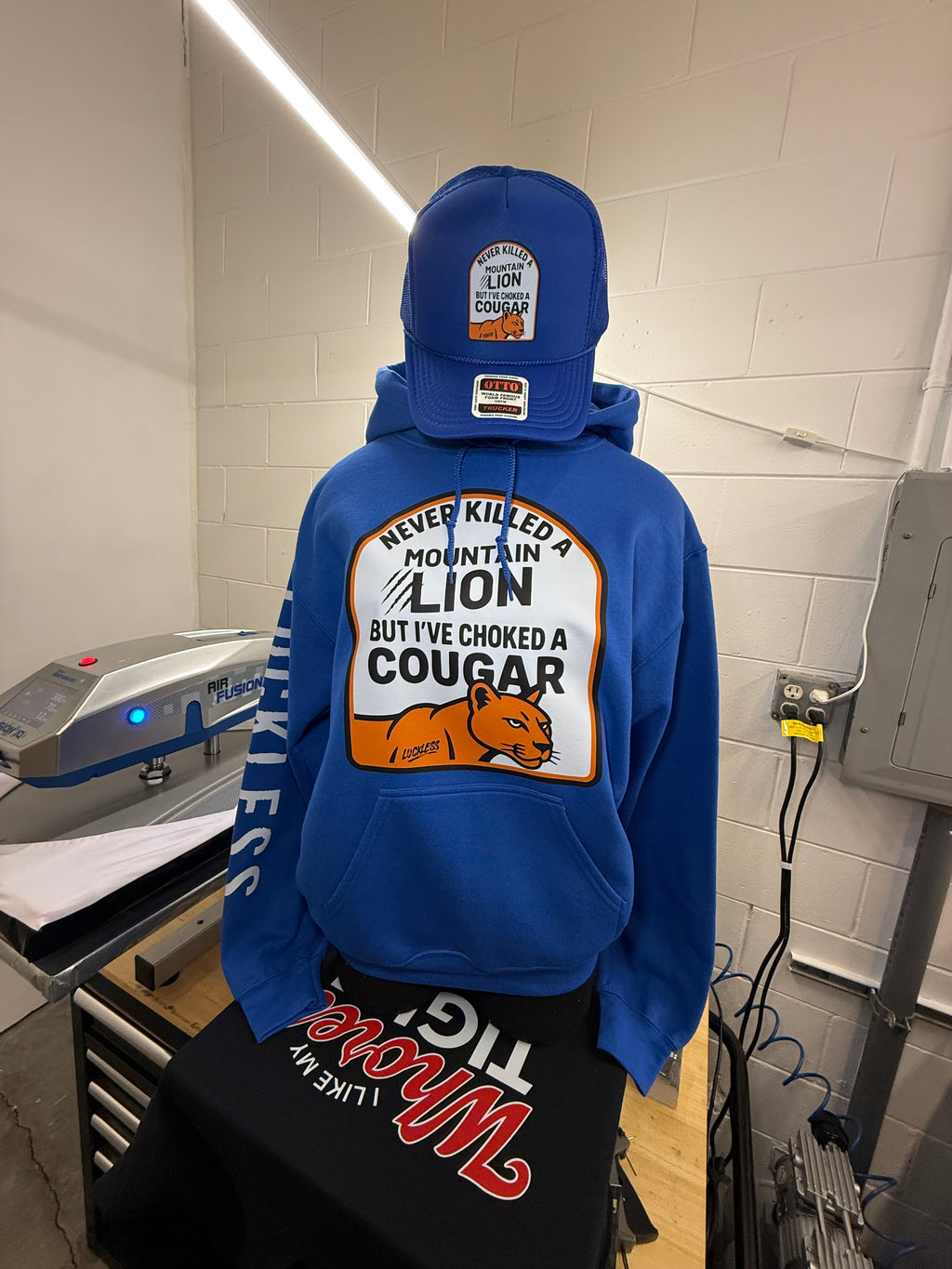 I've Never Killed A Mountain Lion But I've Choked a Cougar | Funny Men's Blue Graphic Hoodie