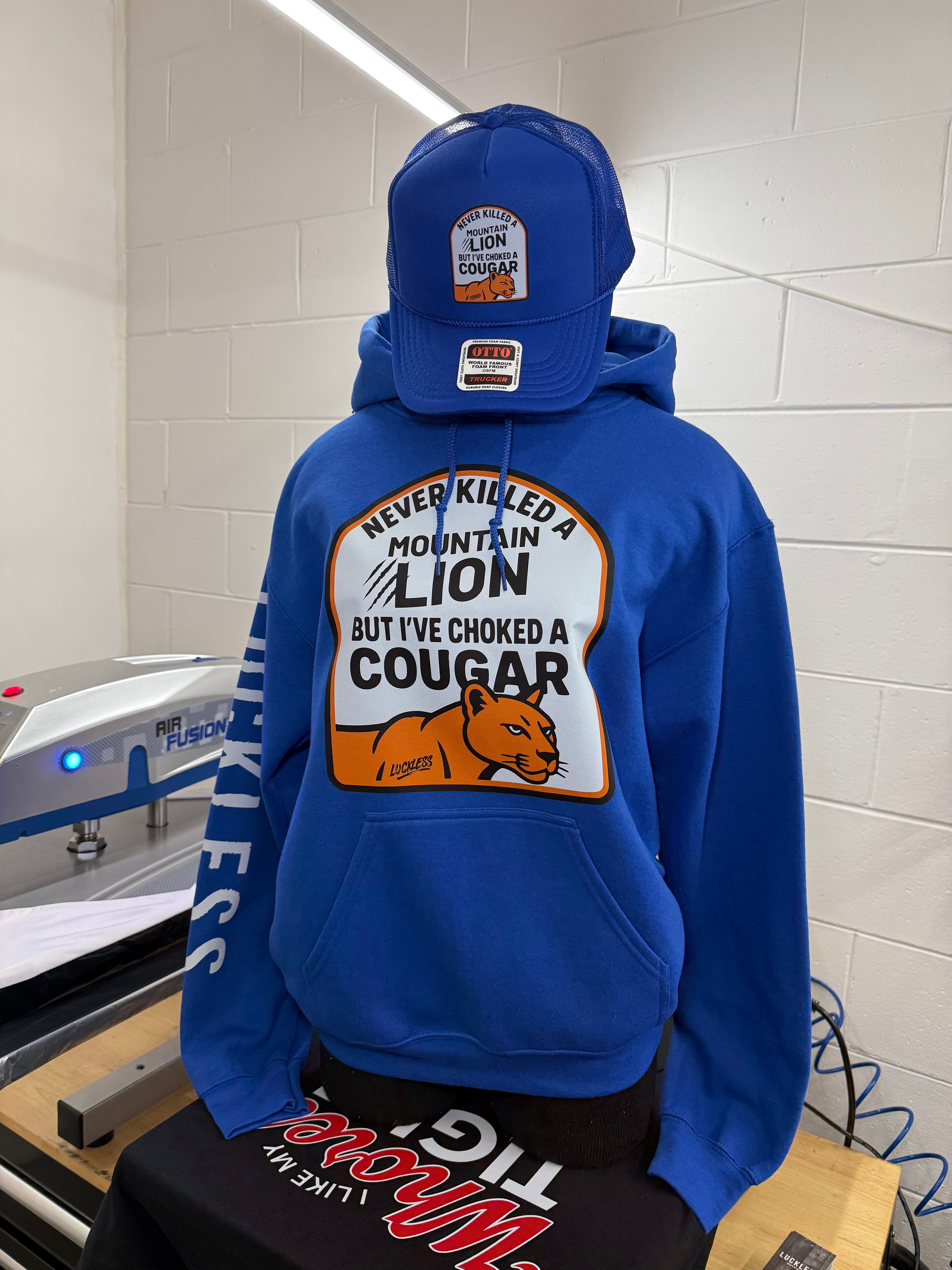 I've Never Killed A Mountain Lion But I've Choked a Cougar | Funny Men's Blue Graphic Hoodie