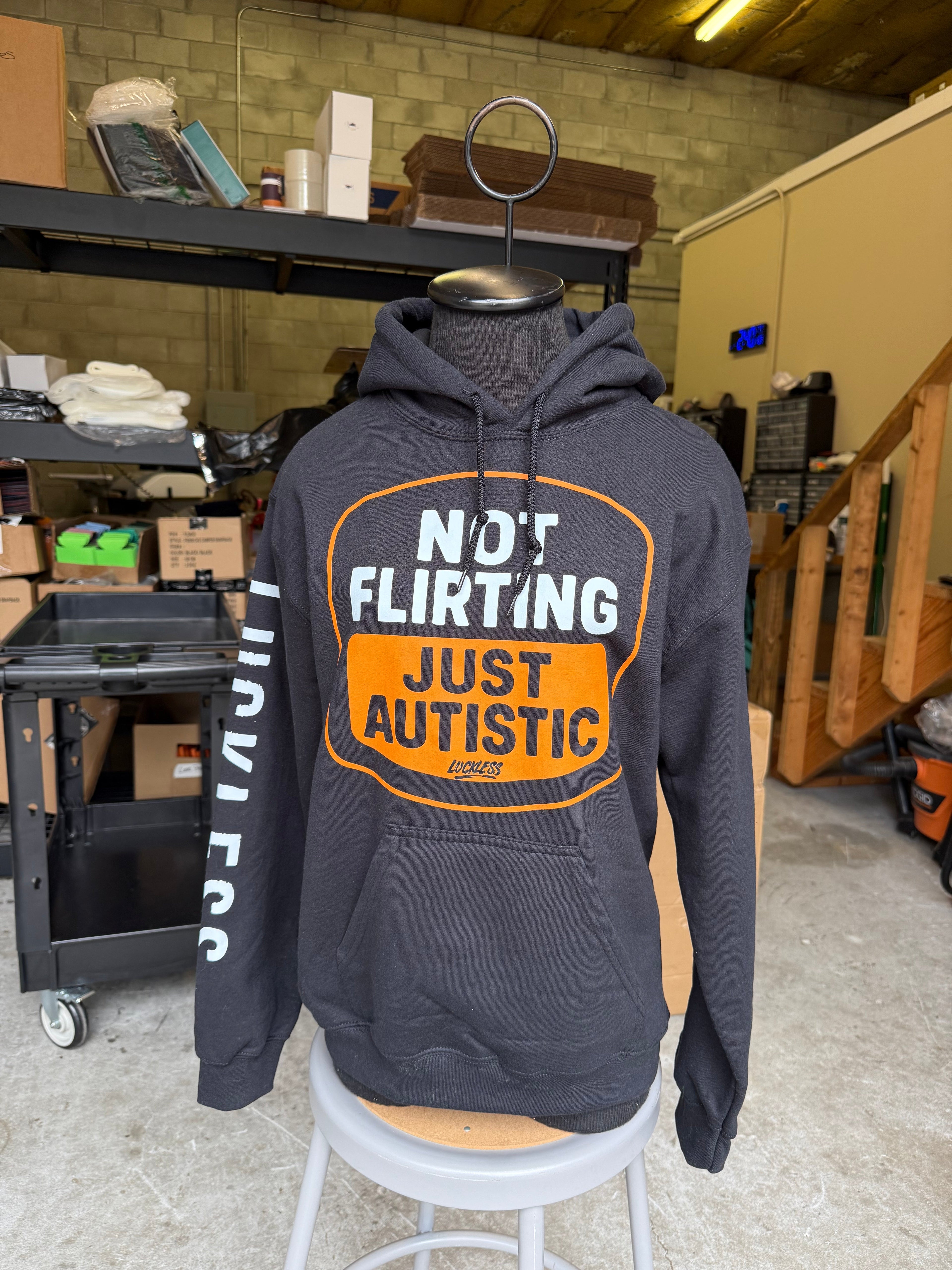 Not Flirting Just Autistic | Funny Men's and Women's Black Graphic Hoodie