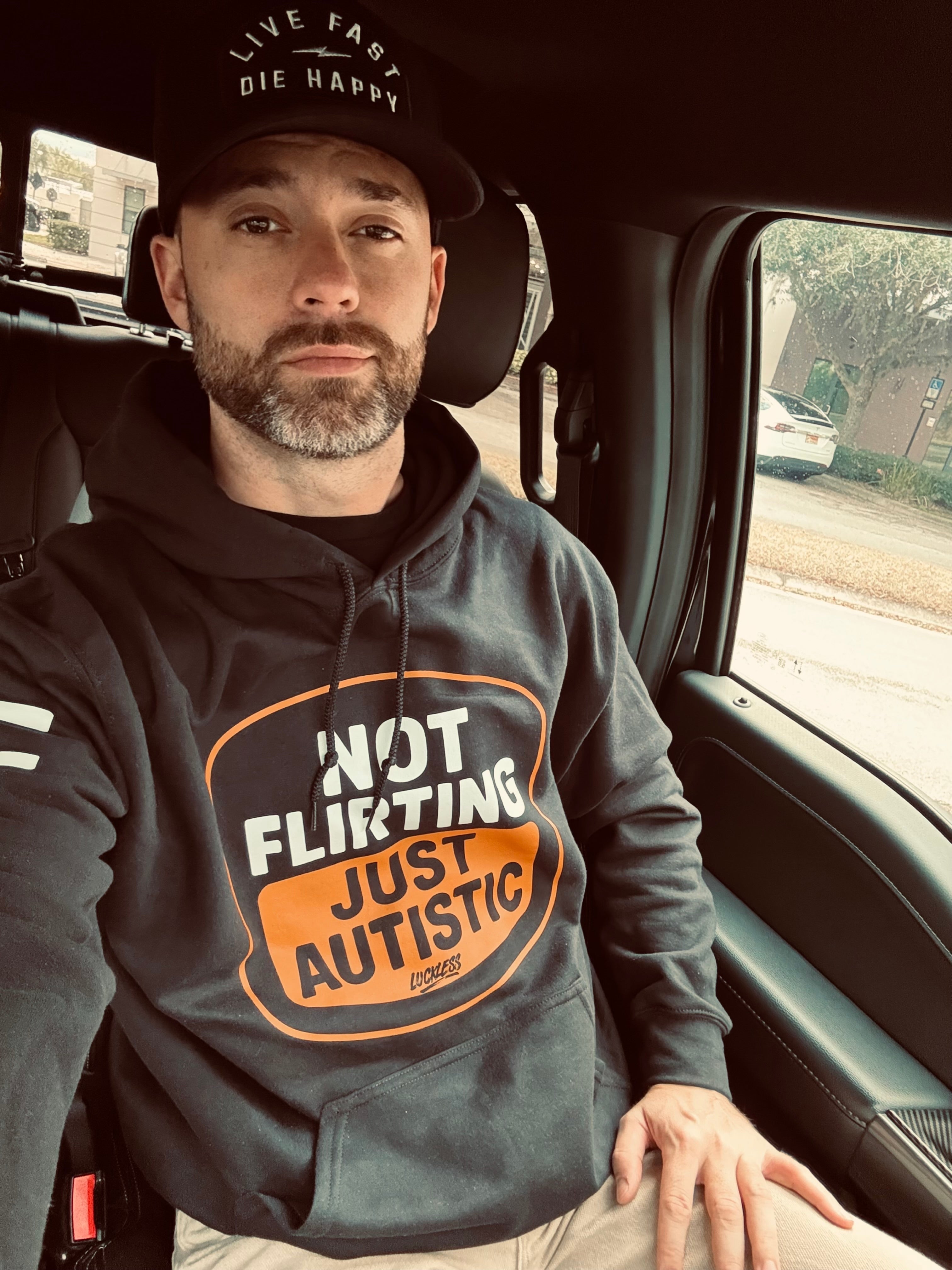 Not Flirting Just Autistic | Funny Men's and Women's Black Graphic Hoodie